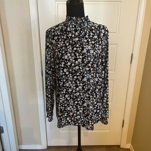 Blue and black floral top, great for work. Worn a handful of times